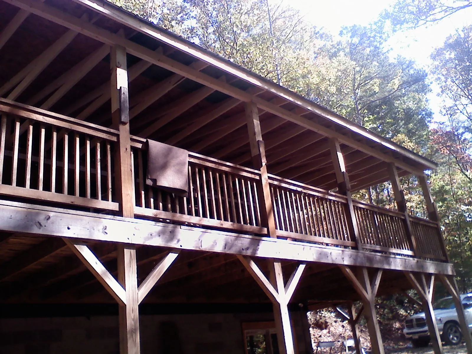 Timber framing under a new elevated porch and deck — Roof Leak Repair in Leonia by Roofing Brothers